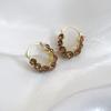 Pendientes de lujo ligeros con forma de U de color champán, estilo retro, con hebilla de oreja, diseño de nicho, de temperamento moderno, nueva joyería para mujer