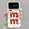 Funda de teléfono aplicable para xiaomi18pro18promax de dibujos animados con pulsera para mujer, colorida, con granos de chocolate