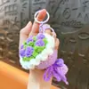 Chaveiro de crochê de lã transfronteiriço de mão com rosa, acessório de bolsa requintado e fofo, presente para casais, atacado de comércio exterior