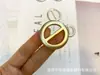 Botón de cintura de resina al por mayor de fábrica botón abrigo cortavientos palabra japonesa botón de tres botones esquina de camiseta botón de ajuste