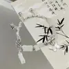 Pulseira Degradê Estrela e Lua Borboleta de Luxo Leve Mais Vendida para Mulheres, Novo Design de Nicho Estilo Chinês, Colorida Versátil para Estudantes e Melhores Amigas
