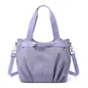 Bolsa de tela de nailon de gran capacidad para uso casual y para ir al trabajo para mujer, modelo nuevo 2026, bolsa para clase de estudiante universitario, bolsa de hombro tipo tote para ir al trabajo