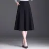 Falda Sencilla Versátil de Color Sólido para Mujer 2026 Otoño Nueva de Cintura Alta Adelgazante Acampanada para el Trabajo de Longitud Media Falda de Línea A