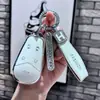 Adecuado para 24 Estuche para Llaves Arashitu Dreamer Edición Especial 22 Plano Edición Baja en Carbono 23 Estuche para Llaves de Coche Hebilla de Concha de Alta Calidad