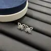 Aretes de Mariposa Hueca Ilusión para Mujer, Grueso Chapado en Oro de 18K, Llenos de Diamantes, Lujo Ligero, Estilo Dulce, Venta Directa de Fábrica, Transmisión en Vivo, Dropshipping