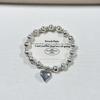 Tienda de oro con amor pulsera de ojo de gato con láser retro exquisita de alta calidad pulsera de cuentas de transferencia dorada para regalo de novia