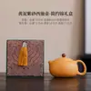 Bule Xishi de Areia Roxa com Segmentos Dourados e Cor Mutável para Uso Doméstico e de Escritório, Caixa de Presente de Bule Cerâmico Fengming, Presente Cultural e Criativo de Alta Qualidade