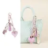 Pingente de Bolsa Cachecol em Forma de Coração Transfronteiriço, Acessório de Bolsa Fashion com Franja de Couro de Alta Qualidade Estilo Ins