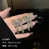 Exquisitos pendientes largos cortos con borlas incrustados de perlas y diamantes para mujer diseño de nicho de lujo ligero pendientes de lazo amor