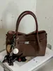 Bolso modelo nuevo 2026 transfronterizo, bolso de mano simple estilo coreano, bolso tipo cubo de moda de gran capacidad, bolso cruzado casual para el día a día