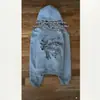 Nuevo suéter con estampado estilo europeo y americano, hoodie oscuro único de estilo urbano, chaqueta retro con capucha de manga larga, estilo callejero holgado y moderno