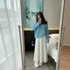 Diseño dulce y elegante, falda midi acanalada blanca, nuevo modelo de otoño 2026, efecto de caída, falda larga de cintura alta adelgazante