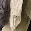 Saia de Alta Qualidade Estilo Workwear 2026 com Bolsos de Cordão, Saia Primavera/Verão com Fenda nas Costas, Saia de Cintura Alta de Comprimento Médio