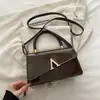 Bolso cuadrado pequeño único, moderno, casual, texturizado, simple, nuevo estilo de nicho para mujer, para hombro y cruzado, primavera 2026
