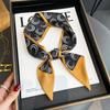 Nuevo patrón floral estilo coreano bufanda larga estrecha de ángulo oblicuo estilo extranjero en stock moda decorativa bufanda banda para el cabello de doble propósito