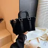 Bolso Cubo Retro Escarchado Portátil para Mujer 2024 Otoño e Invierno Nuevo Moderno Bolso de Hombro Versátil Bolso de Mujer de Gama Alta de Nicho