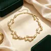Conjunto de collar y pendientes de onda líquida estilo Ins Gargantilla de trabajo pesado bicolor retro oro y plata accesorio versátil