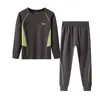 Ropa interior térmica deportiva de lyocell y acetato para niños de otoño e invierno 2026 nuevo modelo conjunto de hogar de tops y pantalones de otoño para niños y niñas