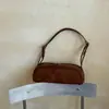 Bolsa feminina de camurça 2026 novo outono vintage Maillard bolsa de ombro para o dia a dia bolsa de mão de nicho