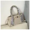Bolso de mano de moda transfronterizo de lujo ligero para mujer, nuevo bolso tote de alta gama con estampado de piedra para el día a día con bufanda de seda, bolso de hombro y cruzado
