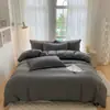 Nuevo juego de sábanas simple de cuatro piezas, funda de edredón, ropa de cama, funda de edredón de color liso, juego de tres piezas para cama de dormitorio de estudiante