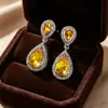 Brincos de zircônia em formato de gota de alta qualidade, da Ziyu, elegantes e da moda, para mulheres, perfeitos para combinar com vestidos de noiva e trajes formais, com aparência cintilante