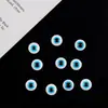 Venta al por mayor de fábrica resina ojo azul oblea Ojo Turco del Diablo ojo azul cuenta plana azul accesorios para ropa