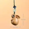 Colgante de Pagoda Wenchang de sándalo verde tallado en madera con borlas, charm para bolso, artículo decorativo, llavero del zodiaco vaca y conejo, trabajo en madera con cuerda tejida