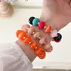 Pulsera elástica de cuentas planas estilo vintage europeo y americano para mujer, pulsera de resina superventas transfronteriza, joyas y accesorios para la mano