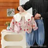 Moda linda con tema de conejo, nuevo estilo, conjunto versátil de manga larga para niñas jóvenes, chaqueta de dibujos animados, conjunto moderno de tres piezas