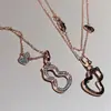 Collar de calabaza hueco con diamantes completos versión alta para mujer, cadena para clavícula, chapado en plata de ley 925, oro rosa de 18 quilates, colgante fluorescente, venta al por mayor