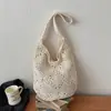 Llegada de verano de moda: un bolso tejido floral colorido, perfecto para vacaciones y la playa, un bolso de hombro casual