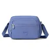 Bolsa Transversal Feminina 2026 Novo Modelo Bolsa de Ombro com Múltiplos Bolsos Urbana Simples Tecido de Nylon Resistente à Água Bolsa Quadrada Pequena Feminina