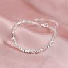 Pulsera Carlene de plata de ley 925 con dos explosiones de TikTok y plata rota. Pulsera roja online para niñas.