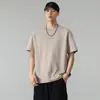 Nova Camiseta de Verão 2026 com Gola Redonda e Manga Curta nas cores Preto, Branco, Damasco e Vermelho Café, Corte Solto com Etiquetas
