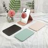 Espejo pequeño transfronterizo, espejo portátil de cuero sintético, mini espejo de maquillaje de escritorio para mujer, espejo de tocador plegable para llevar.