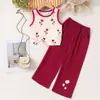 Conjunto de comercio exterior transfronterizo para niñas europeas y americanas, conjunto de chaleco con estampado de verano nuevo y pantalones largos rojos, exclusivamente para venta caliente