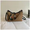 Bolso Tejido de Bloques de Color de Moda para Mujer Verano 2026 Nuevo Bolso Cuadrado Pequeño Casual Simple para el Trabajo y los Viajes Bolso de Hombro