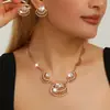 2026 Nuevo Estilo para Mujer Personalidad Exagerada Tendencia Abanico Forma de Cola de Pez Aleación Galvanizada Juego de Joyería de Aretes y Collar