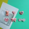 Accesorios de resina con lazo rosa en forma de corazón, pegamento en crema para fundas de teléfono, materiales para horquillas, materiales para parches de zapatos tipo zueco.