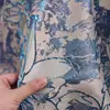 Tela jacquard metálica azul con diseño de plantas y flores para vestidos, ropa y materiales decorativos de diseñador