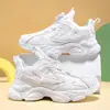 Comercio exterior transfronterizo zapatos para niños zapatillas infantiles cuero blanco zapatillas de correr para niñas hebilla giratoria zapatos de estudiante