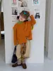 Camiseta base de manga larga con volantes estilo coreano para niña, cárdigan de punto elegante y versátil, conjunto casual de dos piezas con pantalones para otoño 2026