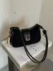 Bolso de mano nuevo para mujer 2026, moderno, versátil, casual, a la moda, chic, de alta gama, lujo ligero, nicho, elegante, bolso de axila