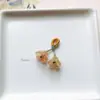 Precio mayorista directo de fábrica pulsera hecha a mano pulsera con colgante diy accesorios pequeños deslizantes colgante de garra de gato lindo Joker