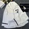 Ropa para el Hogar YD Otoño/Invierno 2024 Nuevo Pijama de Seda de Hielo para Mujer Manga Larga Estilo de Alta Gama Traje de Seda Pequeña Fragancia Camelia