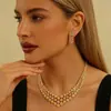 Conjunto de Colar e Brincos Dourados Exagerados de Luxo com Nova Personalidade Cruzada Joias de Corrente para Clavícula de Noiva Casamento Pérola