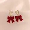 Pendientes de lazo rojo flocado de otoño e invierno de Corea del Sur, pendientes de amor, pendientes dulces, pendientes para mujer