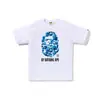 Comercio exterior al por mayor transfronterizo marca de tendencia estilo japonés camuflaje tiburón, cabeza de tigre, hombre-mono bloques de color luminoso manga corta corte holgado camiseta de pareja