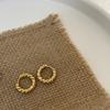 Pendientes de caramelo europeos y americanos con giro retro francés, pendientes dorados simples de nicho, pendientes nuevos de otoño e invierno